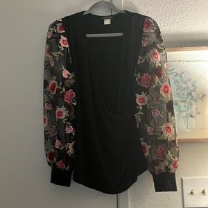 Black Venus floral sleeve top. Deep V sexy cut